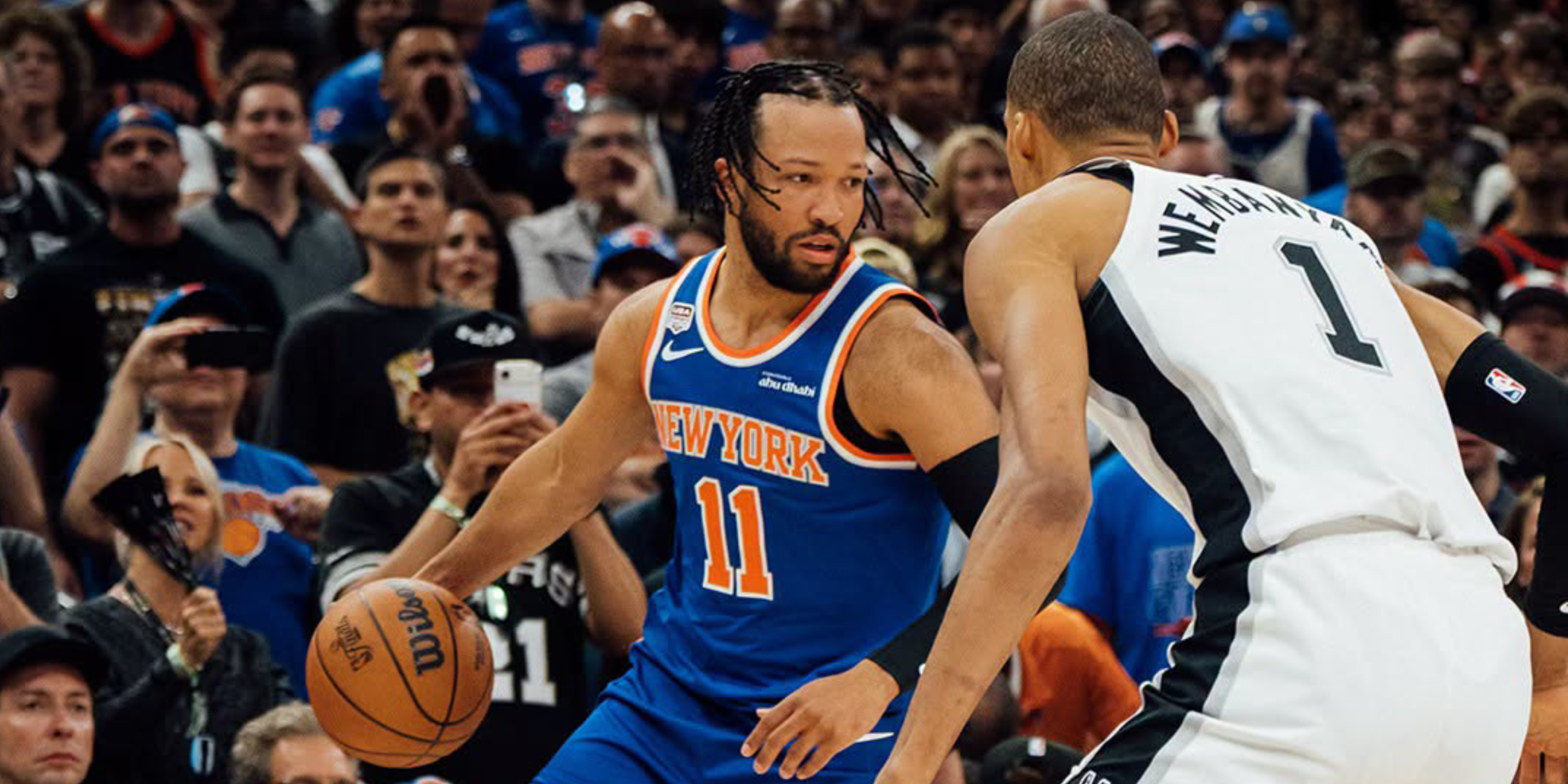 Jalen Brunson (left) looks for an opening as Victor Wembanyama (right) applies defensive pressure. Photo / New York Knicks