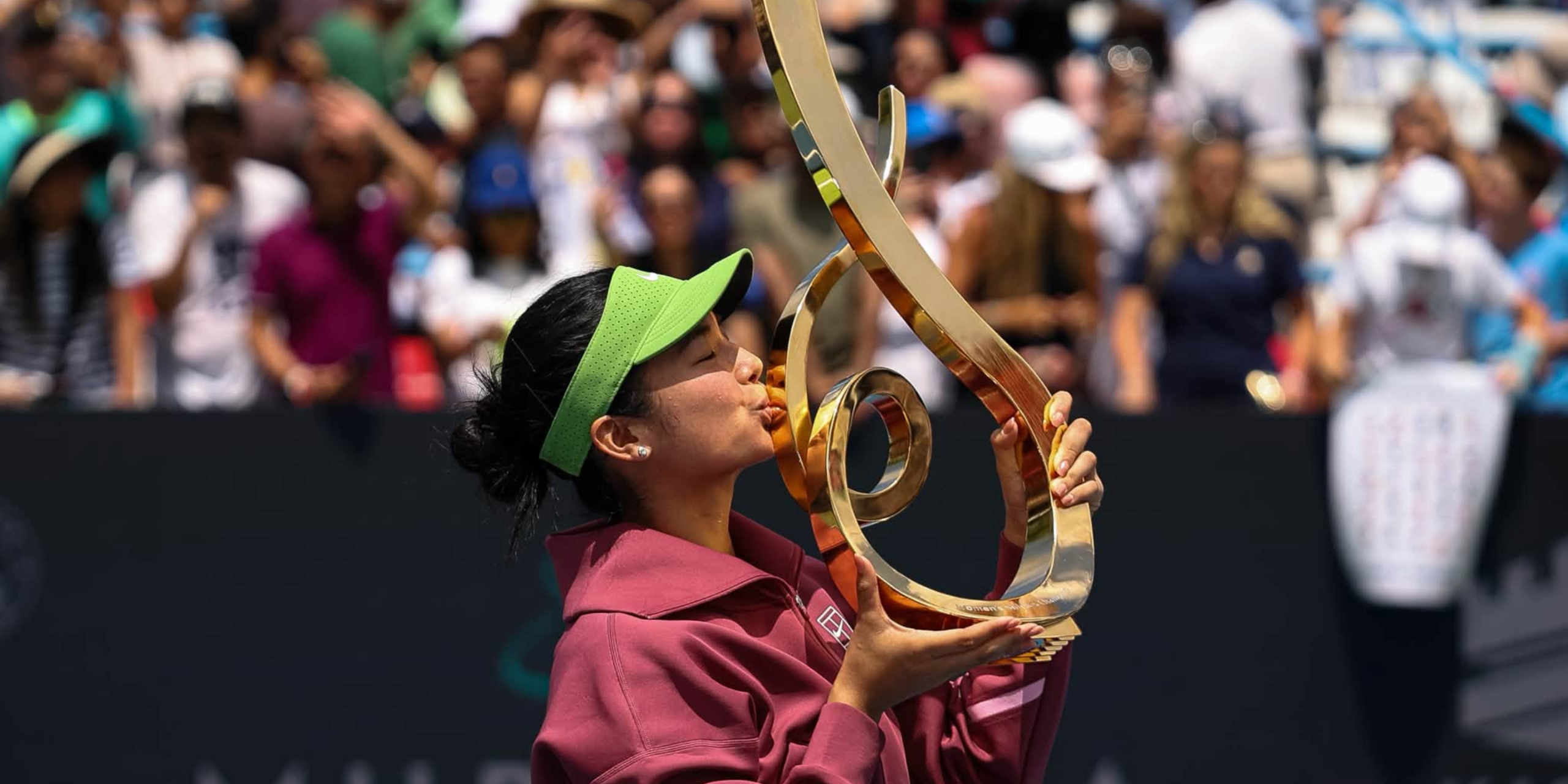 Alex Eala kissing her trophy after winning Mubadala DC Open. Photo / WTA